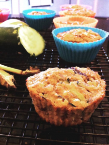 zucchini muffin in bright blue muffin holders