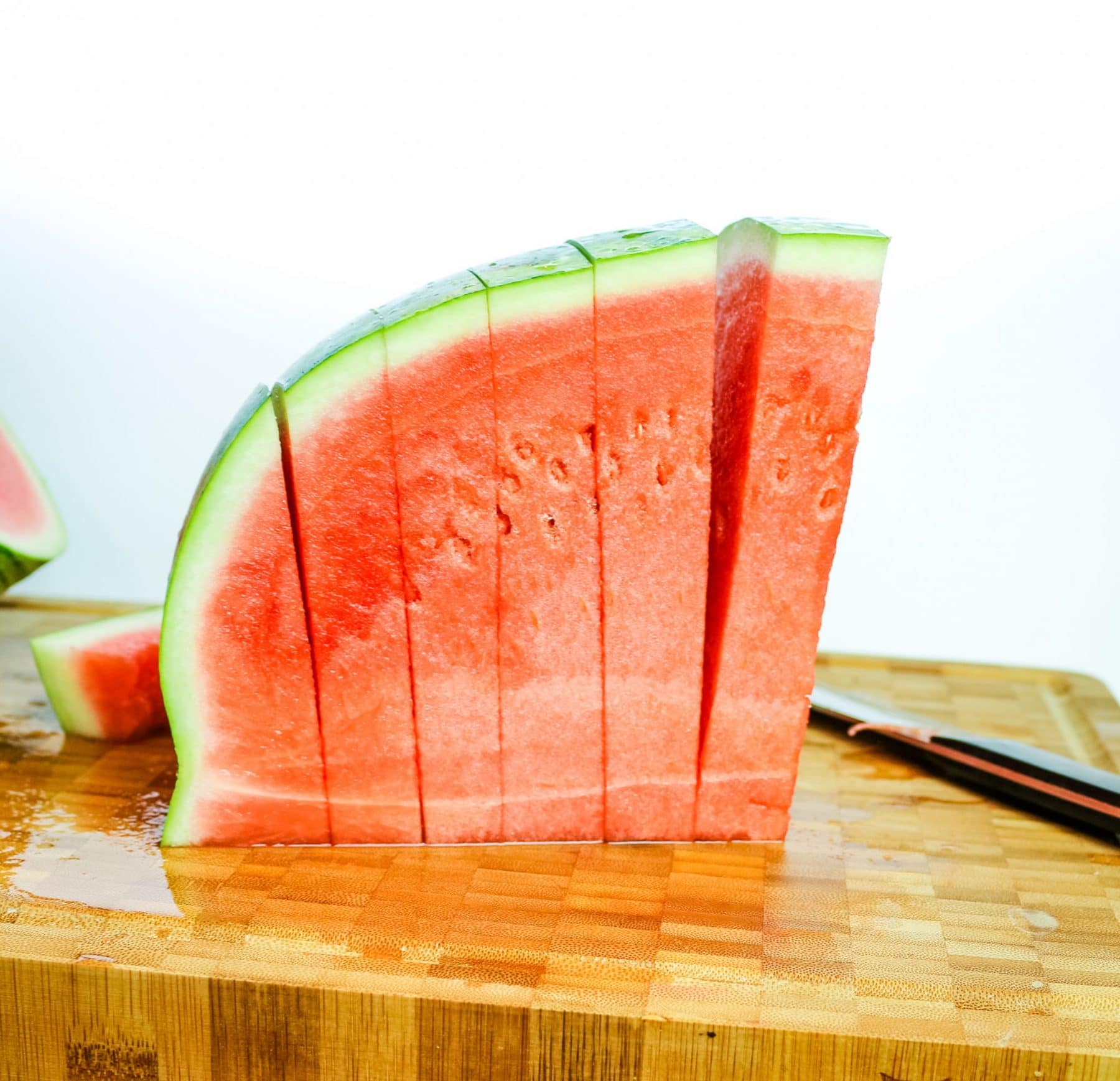 cut watermelon on a cutting board