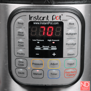 a picture of the front of an instant pot to show all the buttons