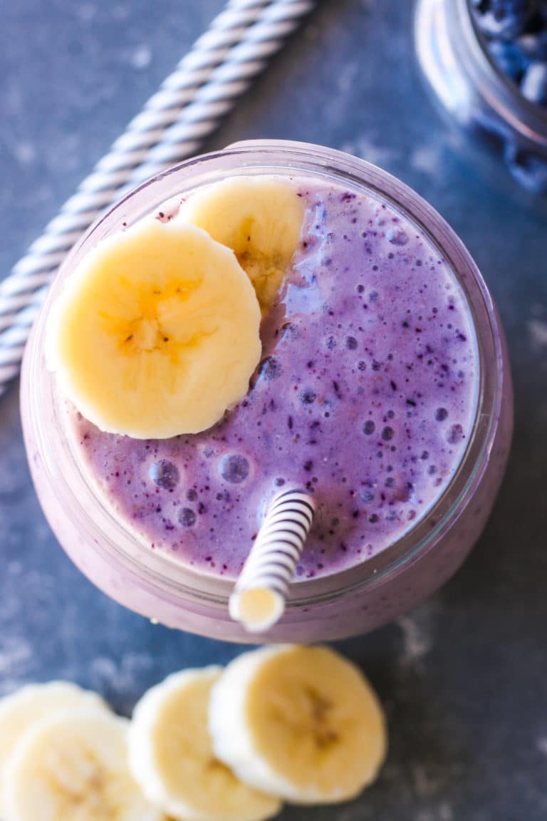 top view of a purple smoothie with banana slices on top