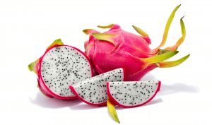 picture of a whole dragonfruit with some slices in the foreground