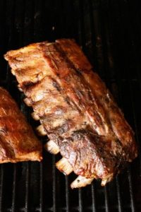 top view of ribs on a bbq qrill