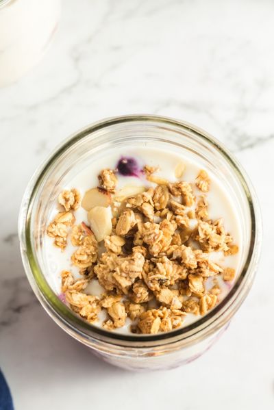 top view of a glass with yogurt and topped with granola