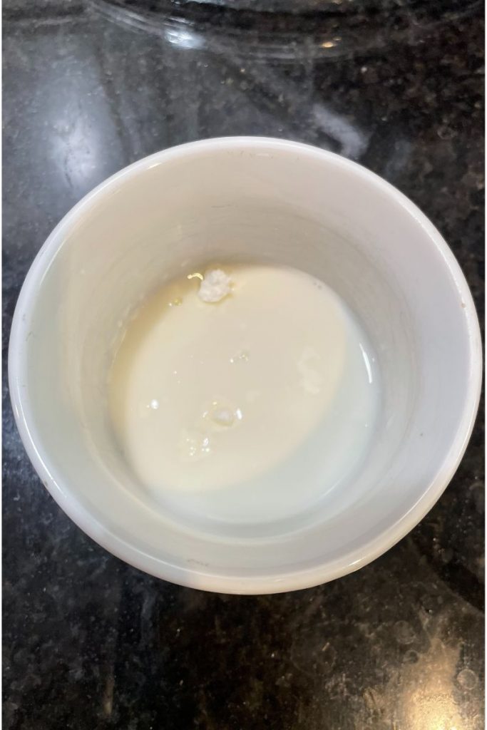 top view of a white bowl with a white liquid