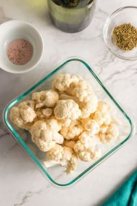 top view or cauliflower florets in a square glass dish